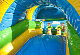 Buy indoor multifun bounce house with slide in jungle theme with a large 3D object of a gorilla on top for children. Order inflatable bounce houses online at JB Inflatables UK