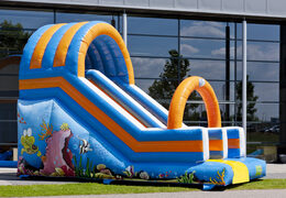 Buy Oceanworld slide with the cheerful colors and nice print on the back wall. Order inflatable slides now online at JB Inflatables UK