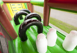 Farm themed inflatable unique 17 meter wide obstacle course with 7 game elements and colorful objects to buy for children. Order inflatable obstacle courses now online at JB Inflatables UK