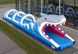 Buy inflatable belly slide 18 meters long, shark themed for children. Order inflatable slides now online at JB Inflatables UK