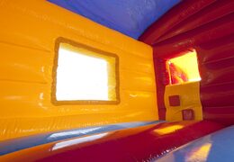 Buy an inflatable indoor maxi multifun bouncy castle in a clown theme with slide for kids. Order bouncy castles online at JB Inflatables UK