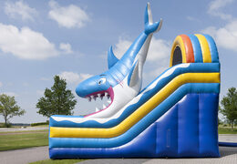 Multifunctional shark-themed inflatable slide with a splash pool, impressive 3D object, fresh colors and the 3D obstacles for kids. Order inflatable slides now online at JB Inflatables UK