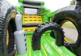 Unique 17 meter wide obstacle course in tractor theme with 7 game elements and colorful objects for kids. Buy inflatable obstacle courses online now at JB Inflatables UK