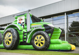 Order a 17 meter wide unique tractor themed obstacle course with 7 game elements and colorful objects for children. Buy inflatable obstacle courses online now at JB Inflatables UK