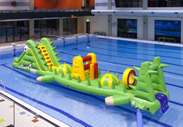 Unique crocodile run pool 12m long with challenging obstacle objects for both young and old. Buy inflatable pool games now online at JB Inflatables UK