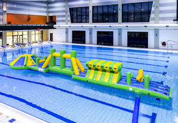 Buy inflatable adventure run green/blue 16m swimming pool with fun objects and round slide for both young and old. Order inflatable pool games now online at JB Inflatables UK