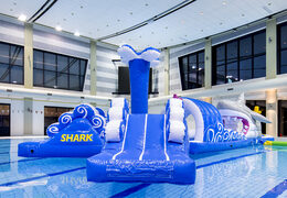 Buy a 13 meter long inflatable shark run assault course in a unique design with funny 3D objects and no less than 2 slides for both young and old. Order inflatable water attractions now online at JB Inflatables UK.