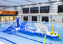 Order 13 meter long obstacle course shark run in a unique design with funny 3D objects and no less than 2 slides for both young and old. Buy inflatable pool obstacle courses online now at JB Inflatables UK