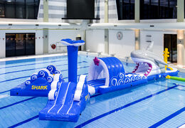 Inflatable 13 meter long shark run swimming pool obstacle course in a unique design with funny 3D objects and no less than 2 slides for both young and old. Order inflatable obstacle courses online now at JB Inflatables UK