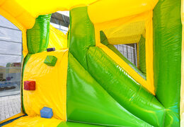 Multiplay Happy jungle bouncer with a slide for children. Buy inflatable bouncers online at JB Inflatables UK