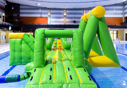 Order an airtight inflatable play island in a crocodile theme with a vine, climbing tower, round slide and obstacles for both young and old. Buy inflatable pool games now online at JB Inflatables UK