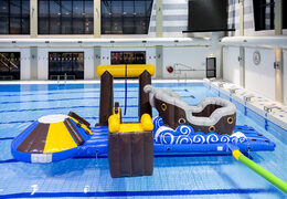 Get an airtight inflatable pirate play island with a vine, climbing tower, round slide and obstacles for both young and old. Order inflatable pool games now online at JB Inflatables UK