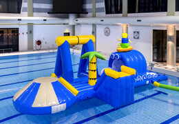 Unique airtight inflatable surfer play island with a vine, climbing tower, round slide and obstacles for both young and old. Buy inflatable pool games now online at JB Inflatables UK