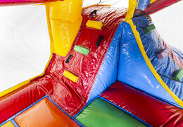 Superblocks themed bounce house with slide and with 3D objects inside for kids. Buy inflatable bounce houses online at JB Inflatables UK