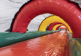 Order Dinopark rollerslide for both young and old. Buy inflatable roller track now online at JB Promotions UK