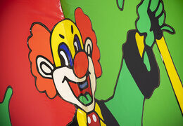 Perfect inflatable slide in clown theme with 3D objects order for children. Buy inflatable slides now online at JB Inflatables UK