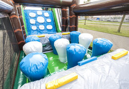 Buy a winter themed inflatable obstacle course with 7 game elements and colorful objects for children. Order inflatable obstacle courses now online at JB Inflatables UK