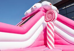 Candyworld themed inflatable bouncer with slides and fun printed obstacles for children. Buy bouncers online at JB Inflatables UK