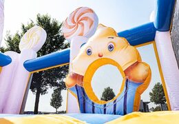 Get a big candyland themed inflatable bouncer with multiple slides and all sorts of fun obstacles with themed prints for kids. Order bouncers online at JB Inflatables UK