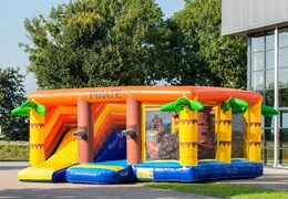 Pirate themed indoor bounce house with a slide on the jumping surface, climbing tower and fun obstacles for kids. Buy bounce houses online at JB Inflatables UK