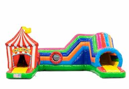 Buy a large circus bouncy castle with obstacles, a climbing slope and a slide for children. Order bouncy castles online at JB Inflatables UK