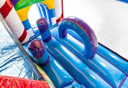 Large inflatable indoor candy multiplay bouncer with slide in Lego theme for kids. Buy bouncers online at JB Inflatables UK