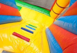 Bouncy castle in pirate boat theme with a slide and 3D objects for kids. Buy bouncy castles online at JB Inflatables UK