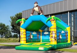 Super bouncy castle with roof in jungle theme for kids. Buy bouncy castles online at JB Inflatables UK