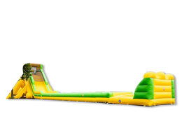 Opblaasbare mega grote glijbaan van 46 meter lang te koop in de kleuren geel met groen