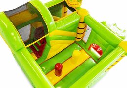 Order a small inflatable bouncy castle with obstacles and slide in dino theme