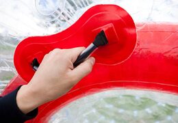 Handle on inflatable ball