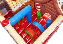 Inside of Multiplay inflatable bouncy castle with arches, pillars, and punching bags