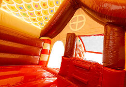 Inside of inflatable in Gingerbread theme, brown red white candies