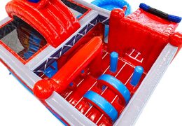 Inside of bouncy castle with arches, pillars, and punching bags for sale at JB