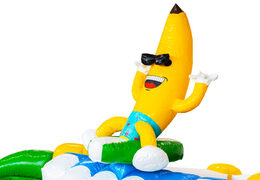 3D figure on inflatable banana with swim trunks theme summer party