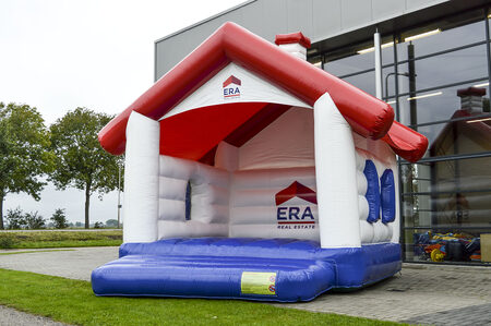 Order now complete custom made Era Real Estate - a frame house bouncy castles in your custom colors and logo at JB Promotions UK. Custom-made inflatable advertising bouncers in different shapes and sizes for sale