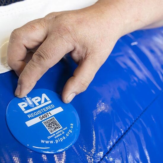 PIPA tested button on a inflatable bounce house