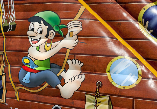 Buy an inflatable extra wide slide in the Pirates world theme with 3D obstacles for kids. Order inflatable slides now online at JB Inflatables UK