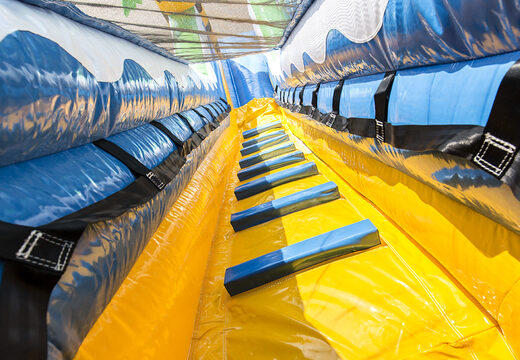 Get your inflatable crocodile slide with the cheerful colors and fun print on the back wall for children. Order inflatable slides now online at JB Inflatables UK