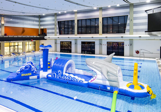 Order 13 meter long obstacle course shark run in a unique design with funny 3D objects and no less than 2 slides for both young and old. Buy inflatable pool obstacle courses online now at JB Inflatables UK