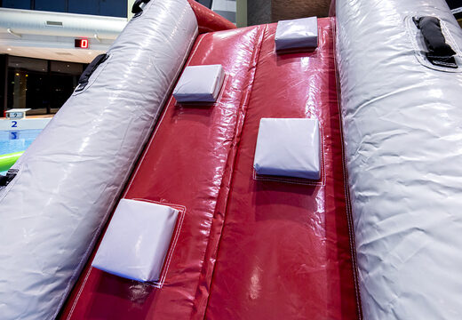 Cool shark themed play island with a vine, climbing tower, round slide and obstacles for both young and old. Order inflatable pool games now online at JB Inflatables UK