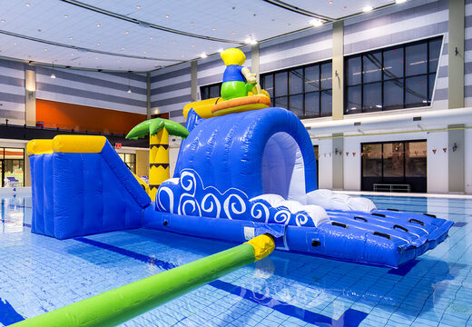 Order an inflatable airtight surfer play island with a vine, climbing tower, round slide and obstacles for both young and old. Buy inflatable water attractions online now at JB Inflatables UK