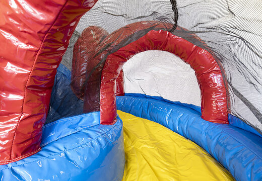 Mini inflatable multiplay bouncer in party theme with slide  for children. Order inflatable bouncers online at JB Inflatables UK