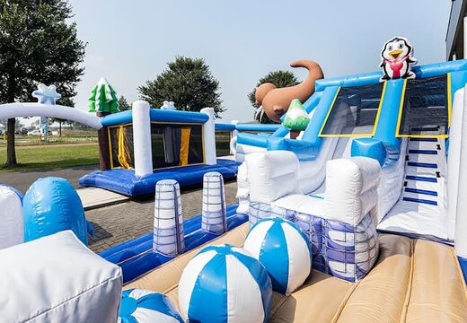 Inflatable Frozen bouncer with slides and fun obstacles with prints for children. Buy bouncers online at JB Inflatables UK