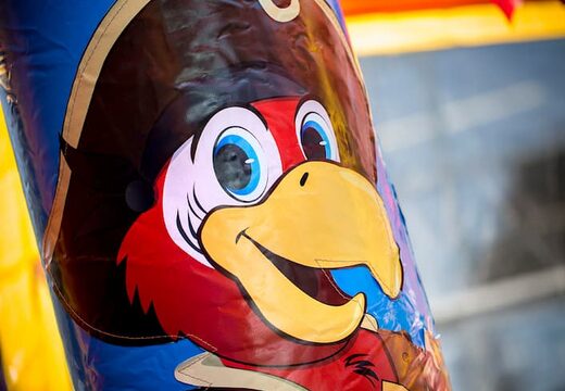 Multiplay indoor pirate bouncy castle with a slide for children. Order bouncy castles online at JB Inflatables UK