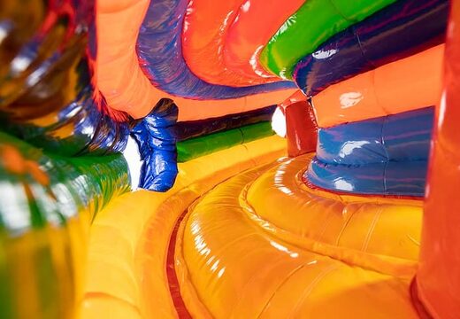 Circus themed inflatable crawl tunnel with obstacles, use a climbing ramp and slide for children. Buy bouncers online at JB Inflatables UK