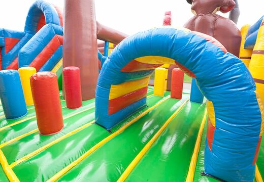 Inflatable multiplay pirate boat bouncy castle with a slide in the middle and 3D objects for kids. Order bouncy castles online at JB Inflatables UK