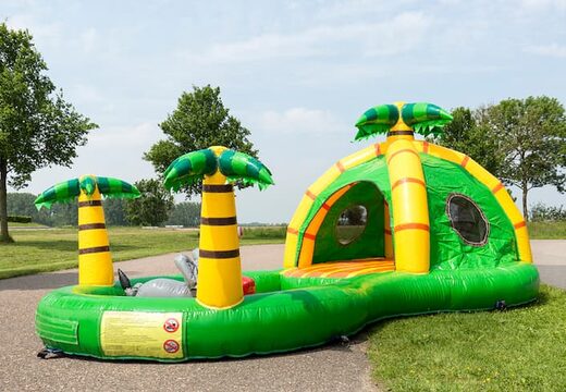 Buy a semi-open playzone jungle bouncy castle with plastic balls and 3D objects for children. Order bouncy castles online at JB Inflatables UK