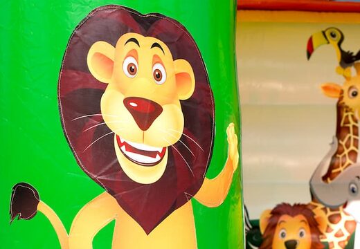 Buy a midi bounce house in a colour combination of green yellow and orange with a jungle theme for kids. Visit JB Inflatables UK online