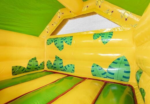 Opblaasbaar luchtkussen met glijbaan in bananen apen thema bestellen